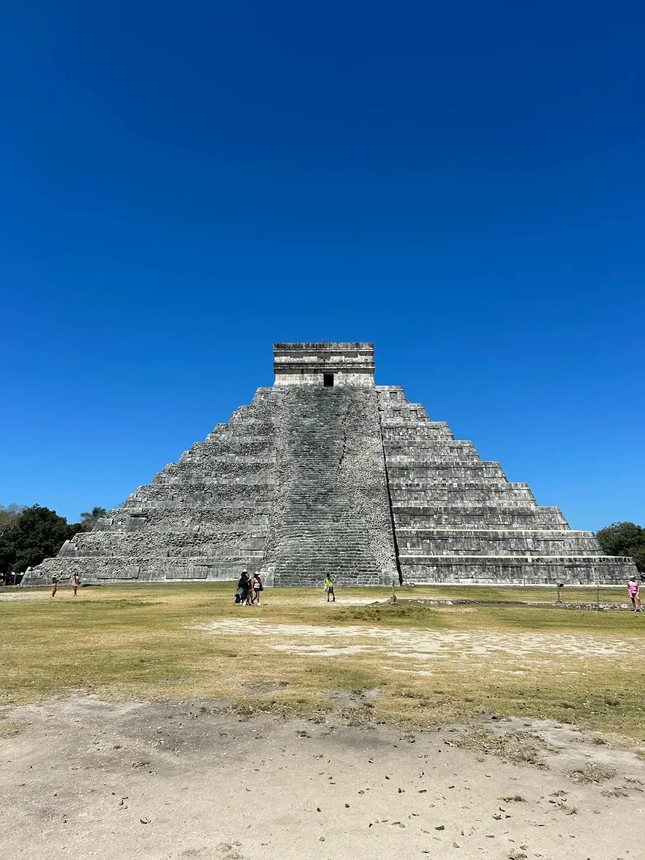 El Castillo pyramid at Chichén Itzá under a clear sky, a day trip from Tulum, Yucatán, Mexico