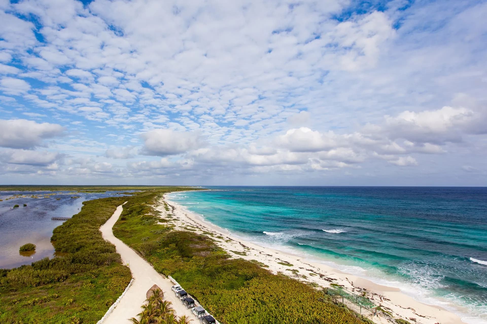 Clearing skies over calm warm water on Cozumel's leeward coast as the rainy season ends in October