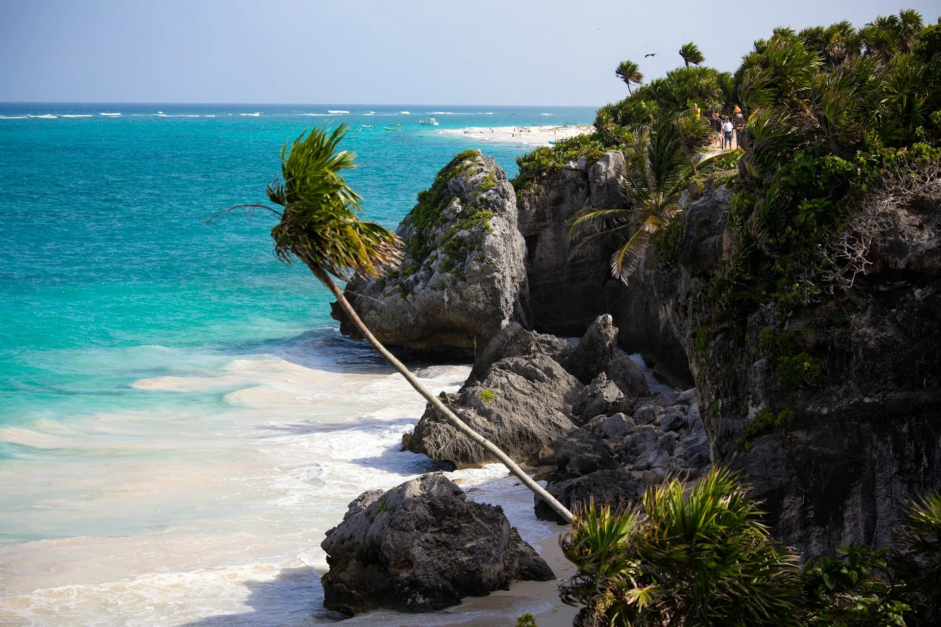 Calm turquoise Caribbean water below the Tulum ruins on a clear, dry February day