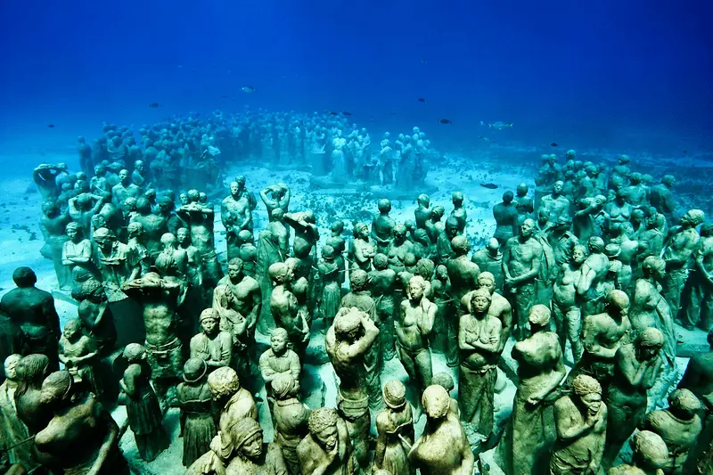 Underwater sunken sculptures at the MUSA Underwater Museum near Isla Mujeres, Mexico